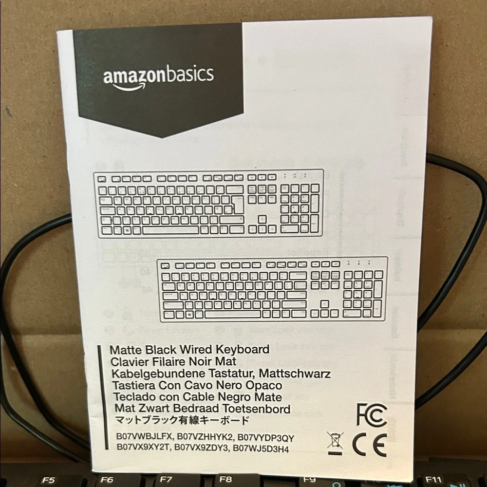 Amazon Basics Wired Keyboard - Sleek Black Design; New with Tags;in original box